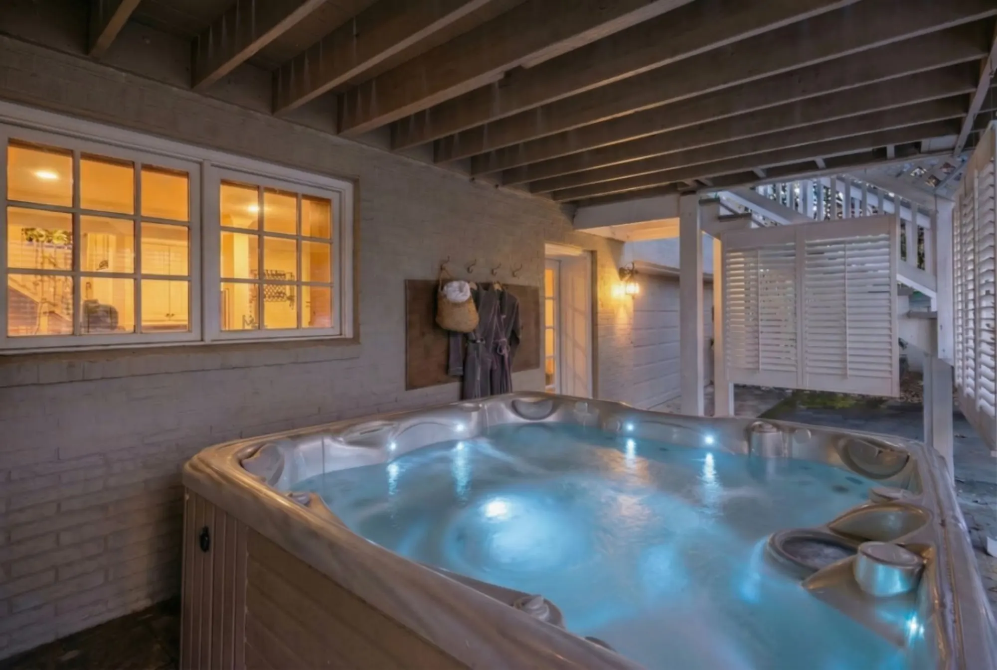 Hot tub at a Leisr Stays managed property in Asheville, North Carolina, about 25 minutes from Mars Hill