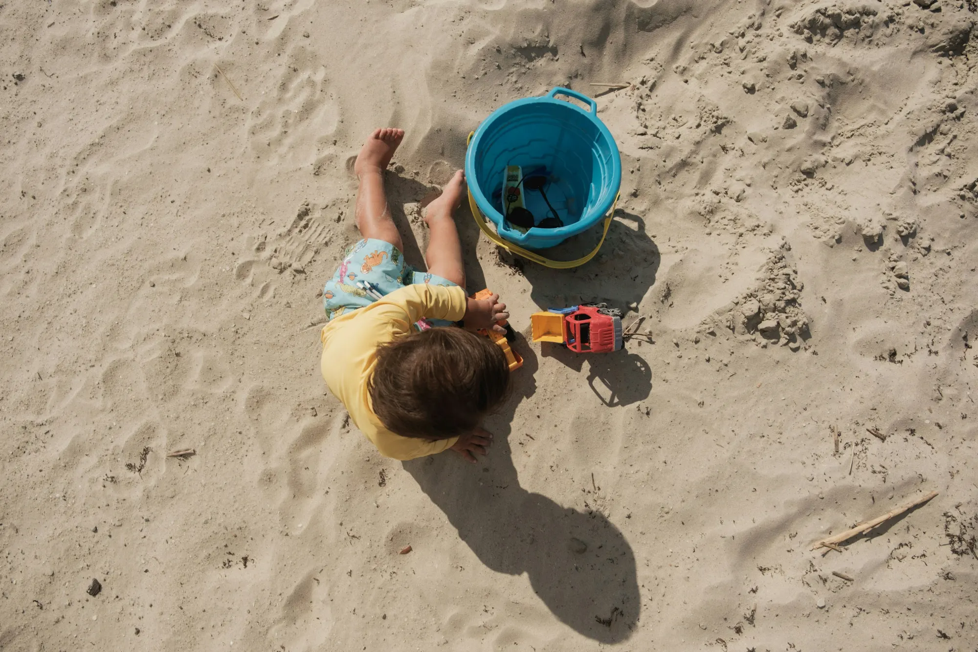 A child playing on the beach at Oak Island, North Carolina